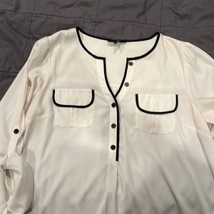 Cream blouse with black trim